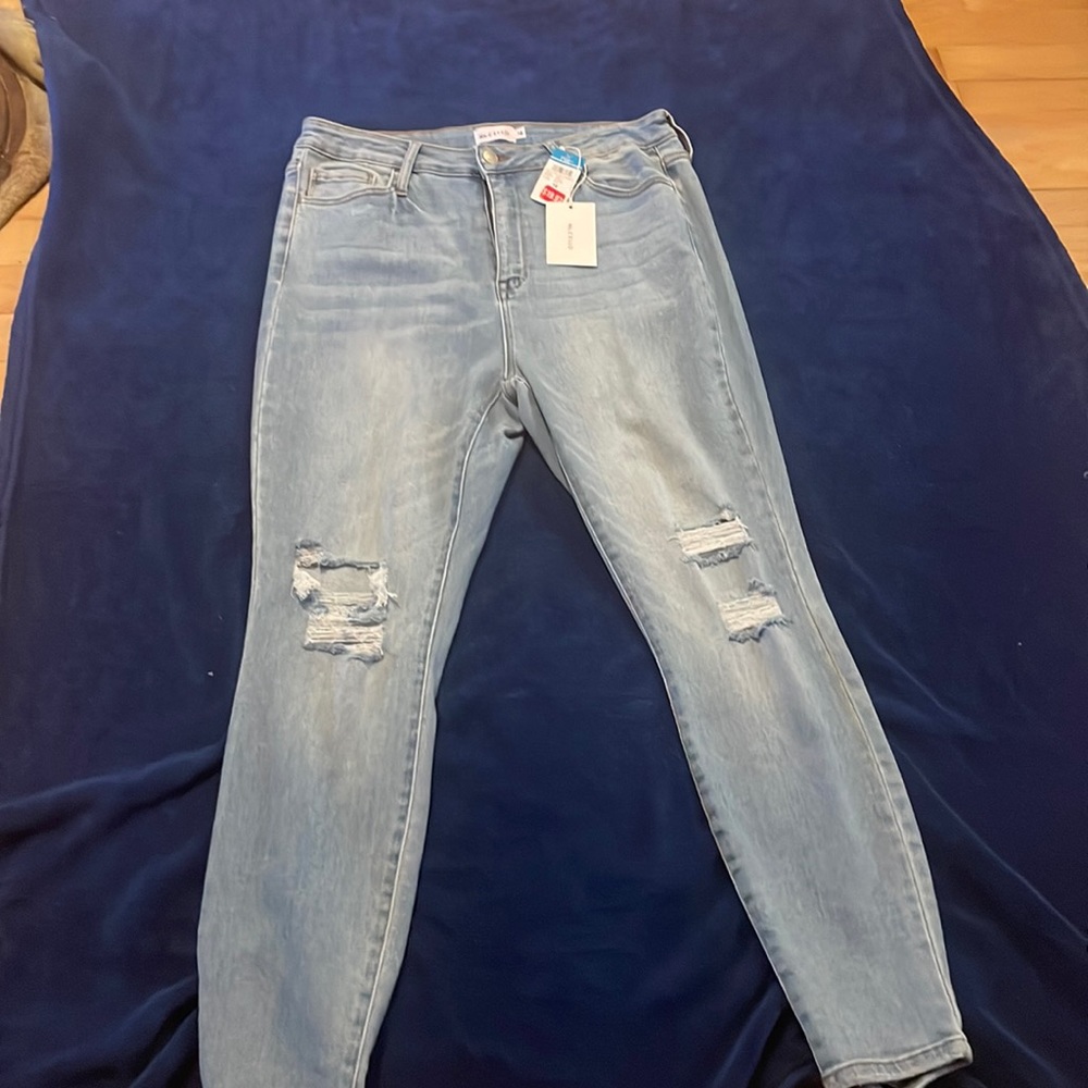 Light Blue ripped jeans from Rue21 (Ms. Cello)